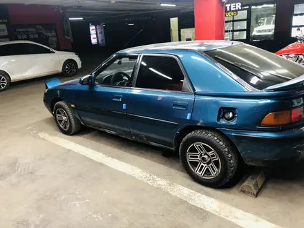 Mazda 323 1992 года за 750 000 тг. в Астана – фото 9