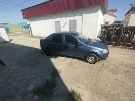 Renault Logan 2012 года за 1 300 000 тг. в Атырау – фото 4