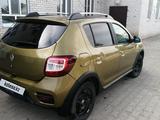 Renault Sandero 2015 годаүшін4 000 000 тг. в Актобе