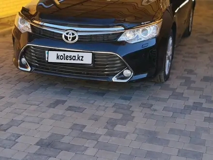 Toyota Camry 2014 года за 10 300 000 тг. в Караганда – фото 2