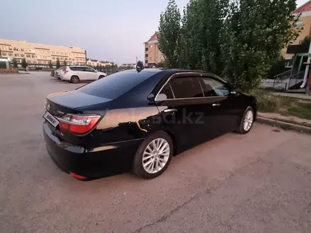 Toyota Camry 2015 года за 11 000 000 тг. в Актобе