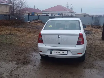 Renault Logan 2013 года за 3 300 000 тг. в Актобе – фото 2