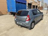 Renault Sandero 2012 года за 2 350 000 тг. в Уральск – фото 2