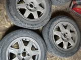 Б/У диски с летними шинами сезон катаные от Kia spektra 185/65R14 за 100 000 тг. в Актобе