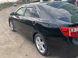 Toyota Camry 2012 года за 8 100 000 тг. в Актобе – фото 3