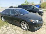 Toyota Camry 2014 года за 5 800 000 тг. в Актобе – фото 2