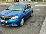 Renault Logan 2014 года за 2 750 000 тг. в Астана – фото 2