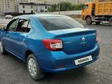 Renault Logan 2014 года за 2 750 000 тг. в Астана – фото 3