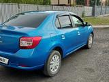 Renault Logan 2014 года за 2 750 000 тг. в Астана – фото 4