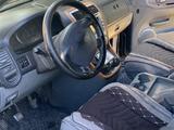 Kia Carnival 2002 года за 1 500 000 тг. в Шымкент – фото 5