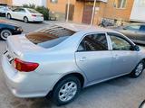 Toyota Corolla 2007 года за 4 600 000 тг. в Астана – фото 2