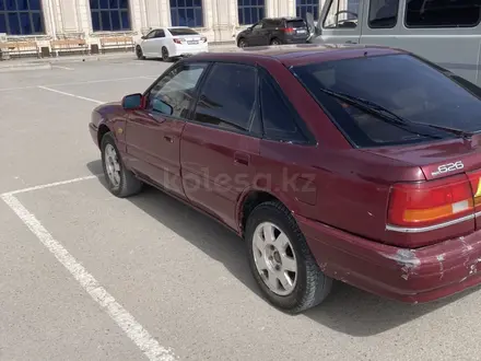 Mazda 626 1991 года за 900 000 тг. в Жанаозен – фото 2