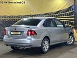 Volkswagen Polo 2015 года за 4 850 000 тг. в Актобе – фото 4