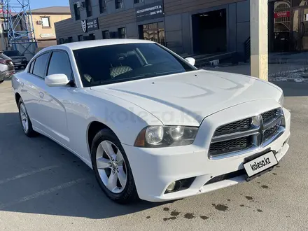 Dodge Charger 2013 года за 7 500 000 тг. в Атырау