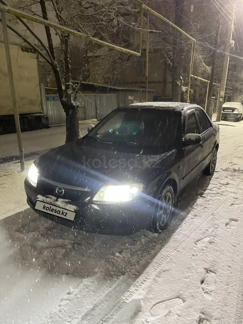 Mazda 323, 2002