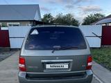 Kia Carnival 2005 года за 4 600 000 тг. в Актобе – фото 3