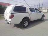 Mitsubishi L200 2011 года за 4 200 000 тг. в Актобе – фото 3