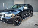 Jeep Grand Cherokee 2011 года за 12 300 000 тг. в Караганда