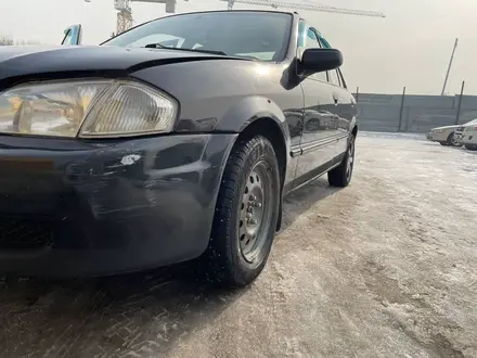 Mazda 323 1999 года за 1 000 000 тг. в Зайсан – фото 23