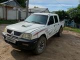 Mitsubishi L200 2005 года за 2 900 000 тг. в Актобе – фото 2