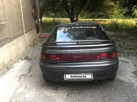 Mazda 323 1990 года за 580 000 тг. в Шымкент – фото 3