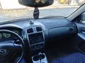 Mazda 323 2002 года за 2 999 999 тг. в Актобе – фото 7