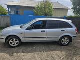 Mazda 323 1999 годаүшін2 450 000 тг. в Аркалык – фото 2