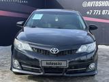 Toyota Camry 2014 года за 8 350 000 тг. в Актобе – фото 2