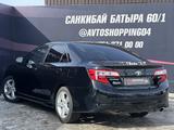 Toyota Camry 2014 года за 8 350 000 тг. в Актобе – фото 3