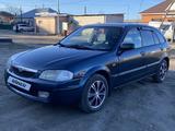 Mazda 323 2000 года за 2 100 000 тг. в Семей