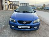 Mazda 323 2002 года за 2 400 000 тг. в Караганда – фото 2