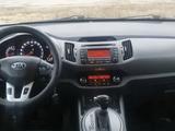 Kia Sportage 2013 года за 7 300 000 тг. в Актобе – фото 2