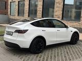 Tesla Model Y 2024 года за 14 200 000 тг. в Алматы – фото 4