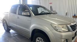 Toyota Hilux 2012 года за 9 000 000 тг. в Жанаозен – фото 2