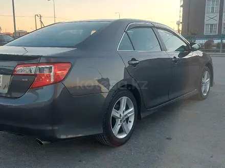 Toyota Camry 2014 года за 8 500 000 тг. в Атырау – фото 4