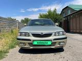 Mazda 626 1998 года за 2 000 000 тг. в Шымкент – фото 2