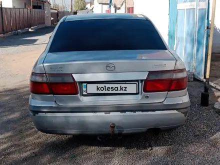 Mazda 626 1998 года за 1 000 000 тг. в Актобе – фото 2