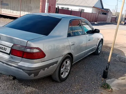 Mazda 626 1998 года за 1 000 000 тг. в Актобе – фото 4