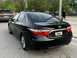 Toyota Camry 2015 года за 6 000 000 тг. в Жанаозен – фото 4