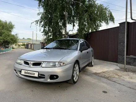 Mitsubishi Carisma 1997 года за 1 400 000 тг. в Алматы – фото 2