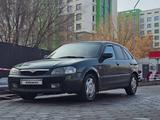 Mazda 323 2000 года за 2 400 000 тг. в Алматы – фото 2