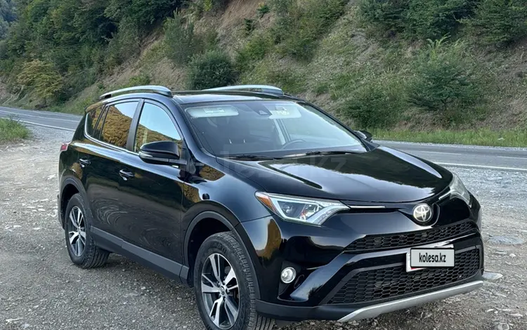 Toyota RAV4 2018 года за 9 400 000 тг. в Жанаозен
