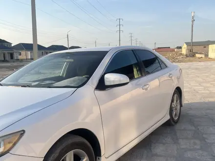 Toyota Camry 2013 года за 4 500 000 тг. в Жанаозен – фото 3