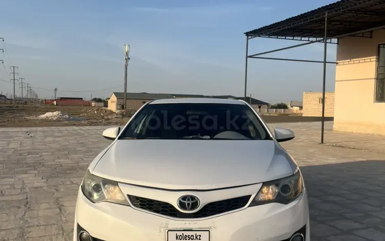 Toyota Camry 2013 года за 4 500 000 тг. в Жанаозен