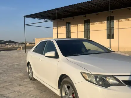 Toyota Camry 2013 года за 4 500 000 тг. в Жанаозен – фото 2