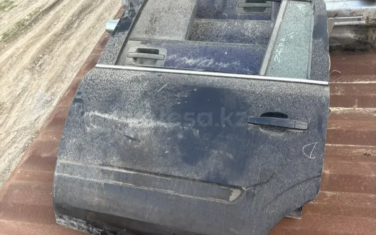 Дверь задняя левая за 90 000 тг. в Алматы