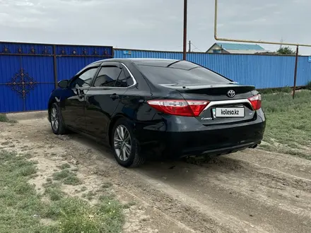 Toyota Camry 2017 года за 8 200 000 тг. в Атырау