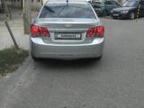 Chevrolet Cruze 2011 года за 3 600 000 тг. в Шымкент – фото 2