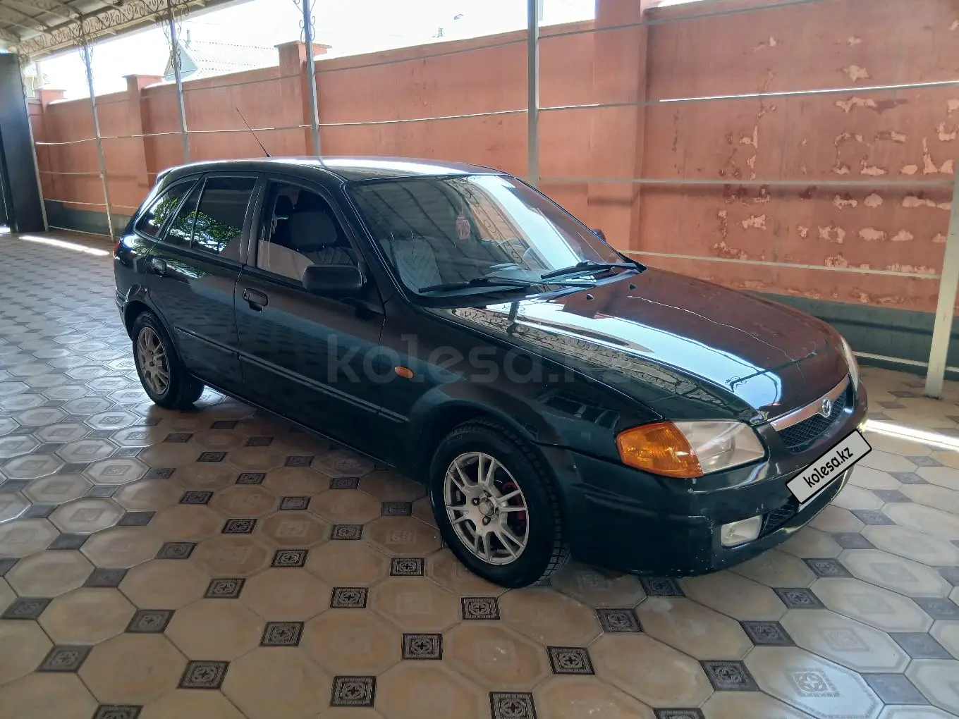 Mazda 323, 1998