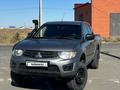 Mitsubishi L200 2015 года за 6 500 000 тг. в Атырау